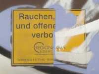 Graffiti auf Plastikschild